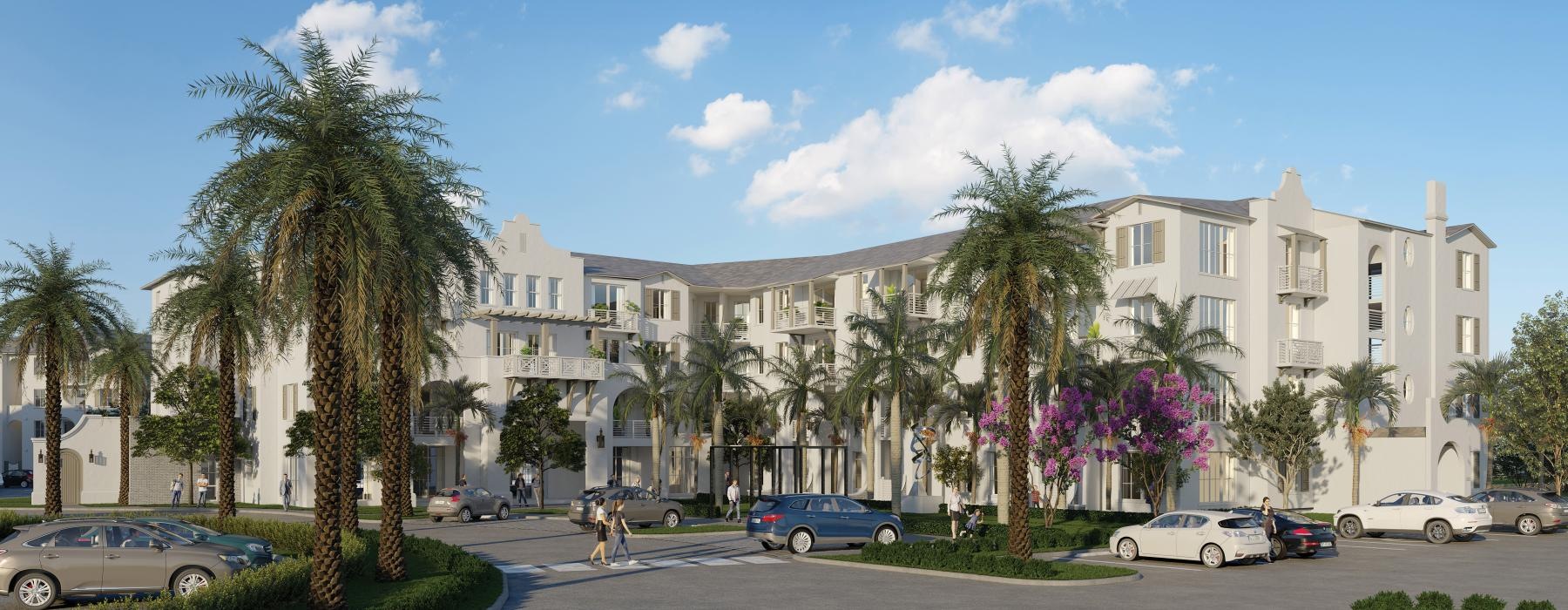 a building with palm trees and cars in front of it