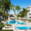 Resort-style swimming pool with lounge seating