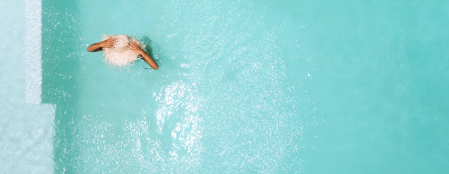 a woman in a pool